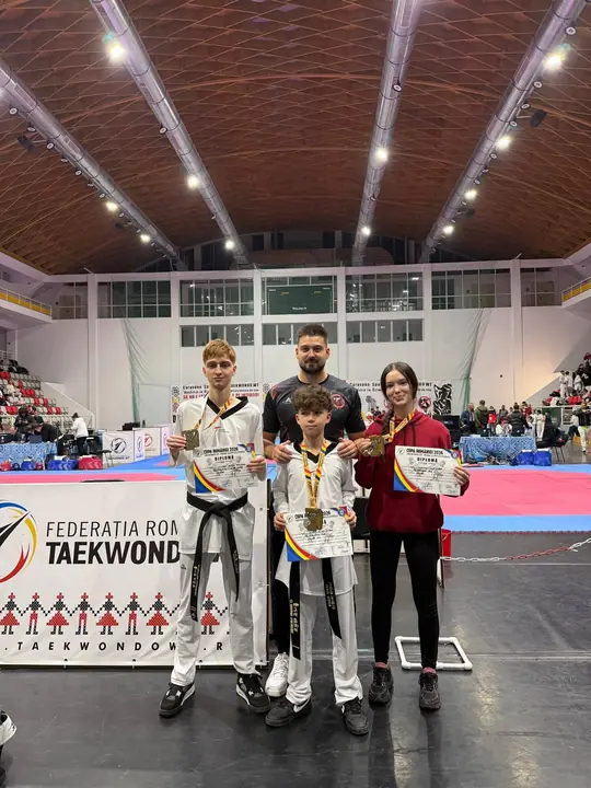 Pe podium, cu antrenorul